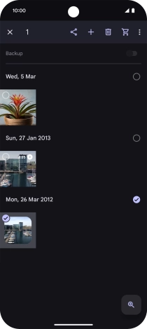 Press the required pictures or videos to select them.