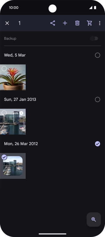 Press the required pictures or videos to select them.