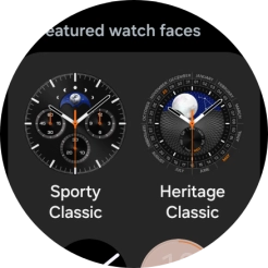 Slide your finger up or down to see the available watch faces.