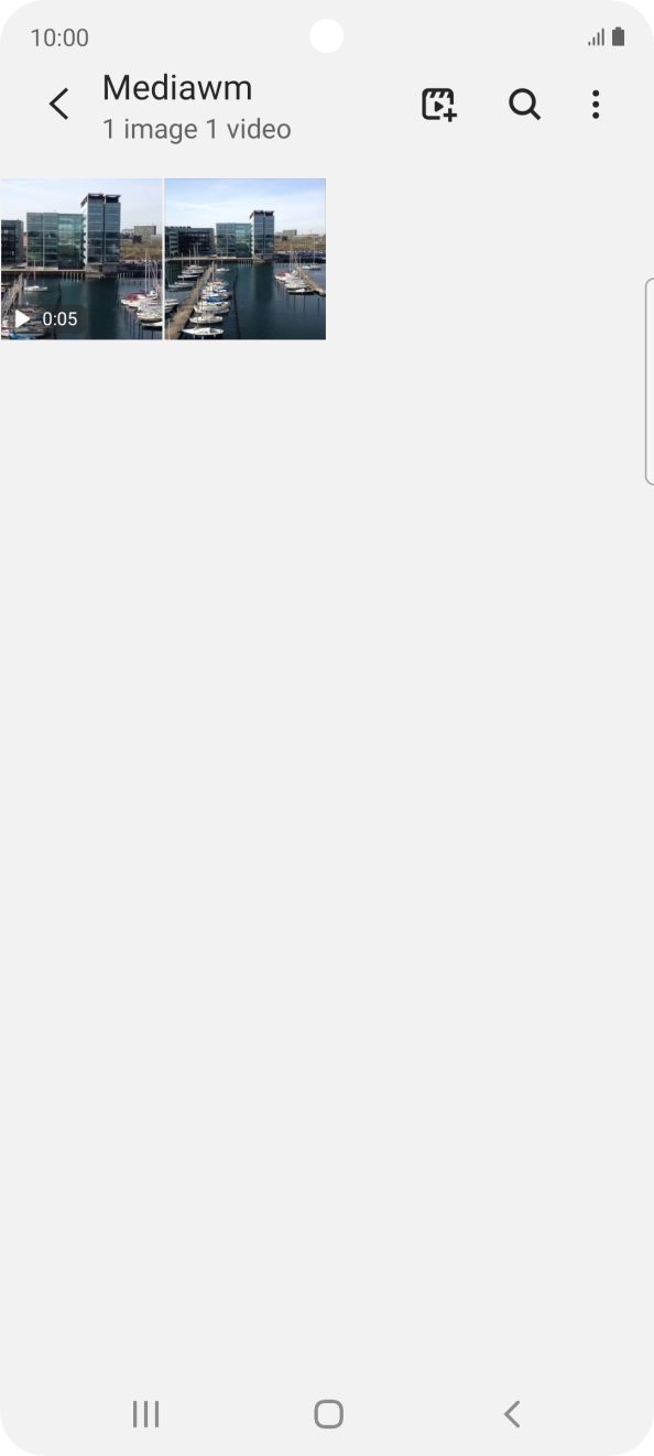 Press and hold any picture or video clip. Press and hold any picture or video clip.