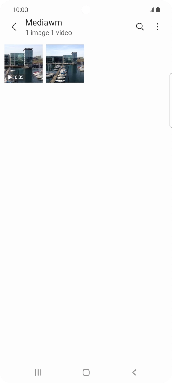 Press and hold any picture or video clip. Press and hold any picture or video clip.