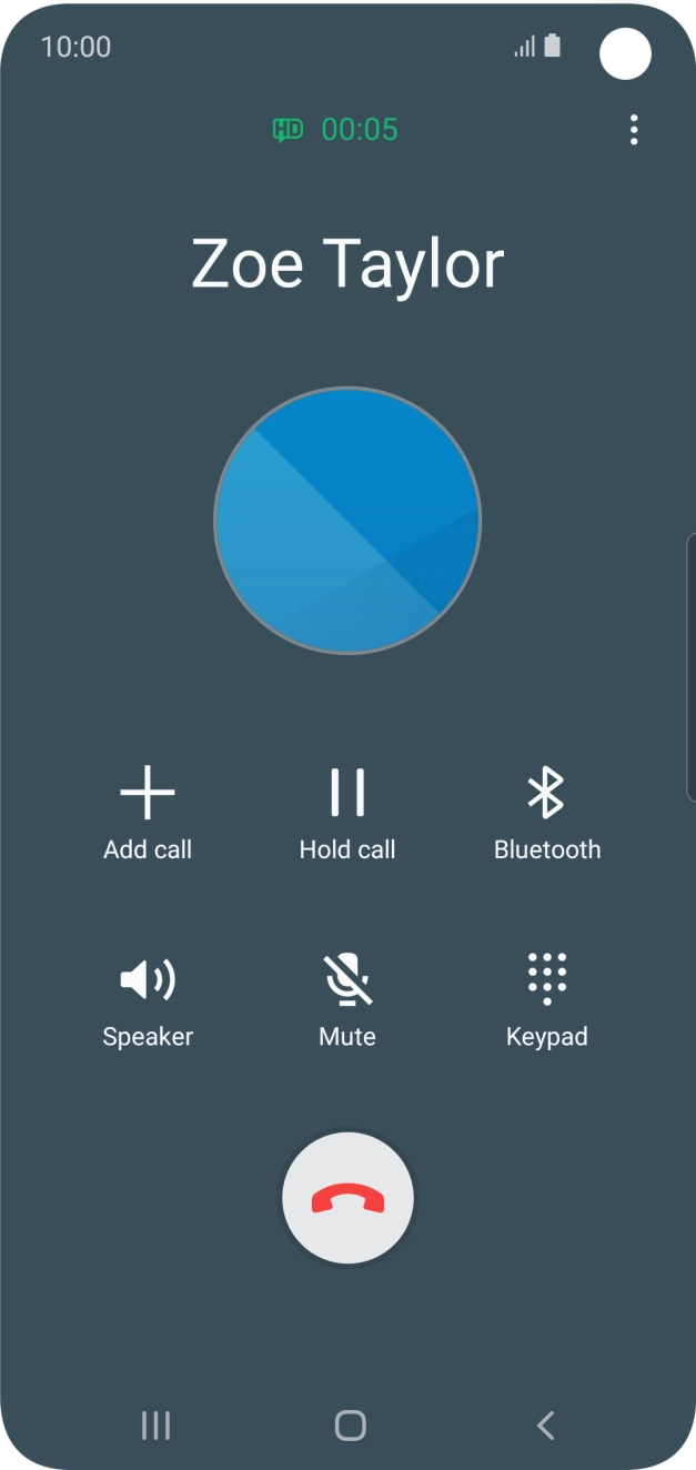 Press the end call icon.