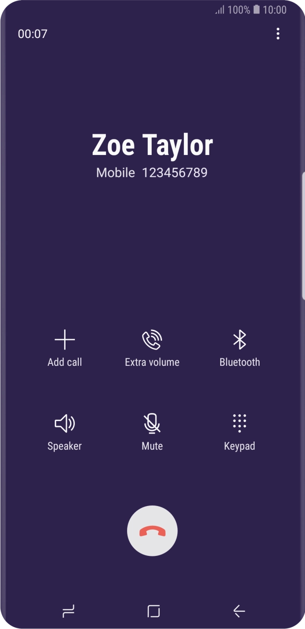 Press the end call icon.