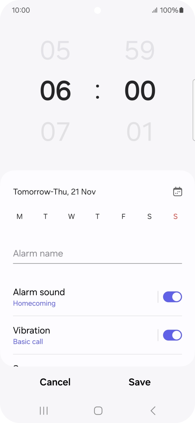 Slide your finger up or down on the hour and minute numbers to set the required alarm time.