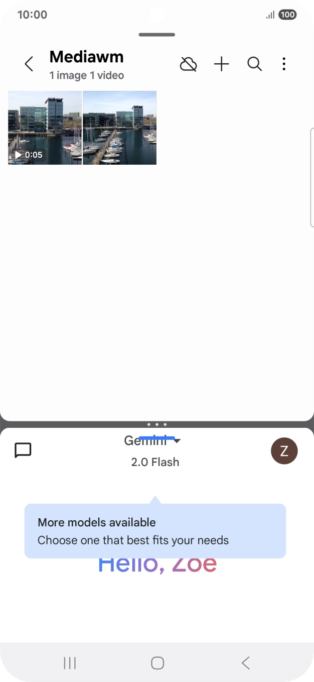 Drag up or down on the screen to adjust the application windows to the required size.