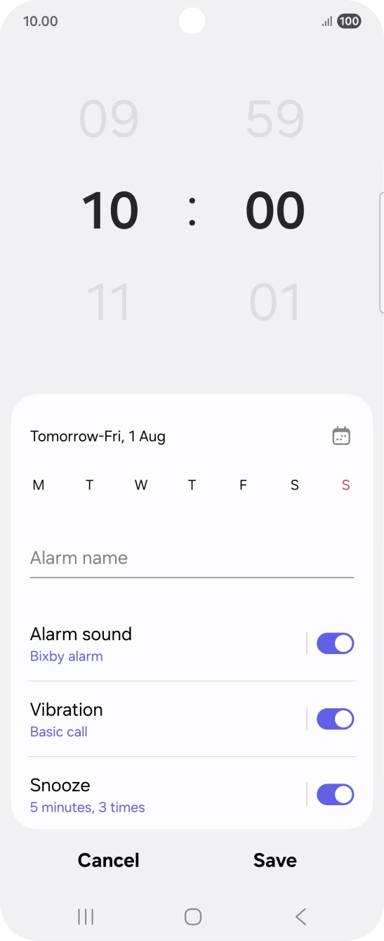 Slide your finger up or down on the hour and minute numbers to set the required alarm time.
