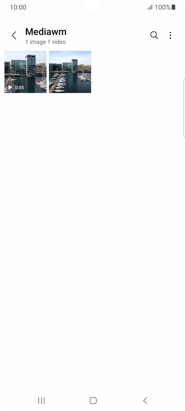 Press and hold any picture or video clip. Press and hold any picture or video clip.