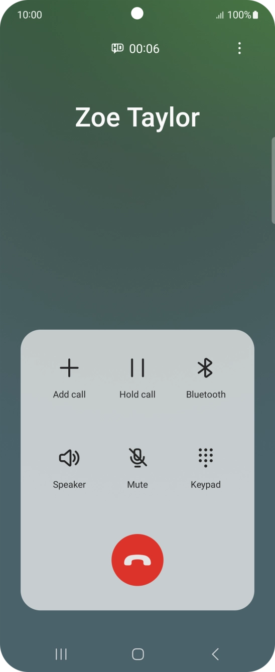 Press the end call icon.