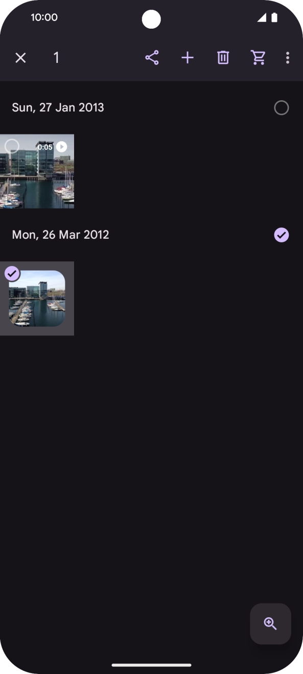 Press the required pictures or videos to select them.