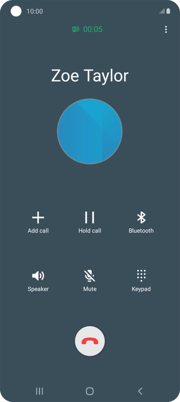 Press the end call icon.