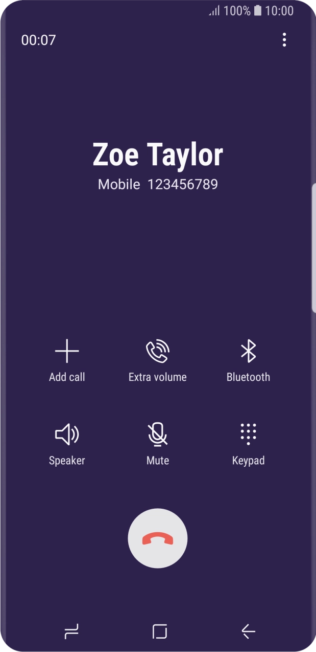 Press the end call icon.
