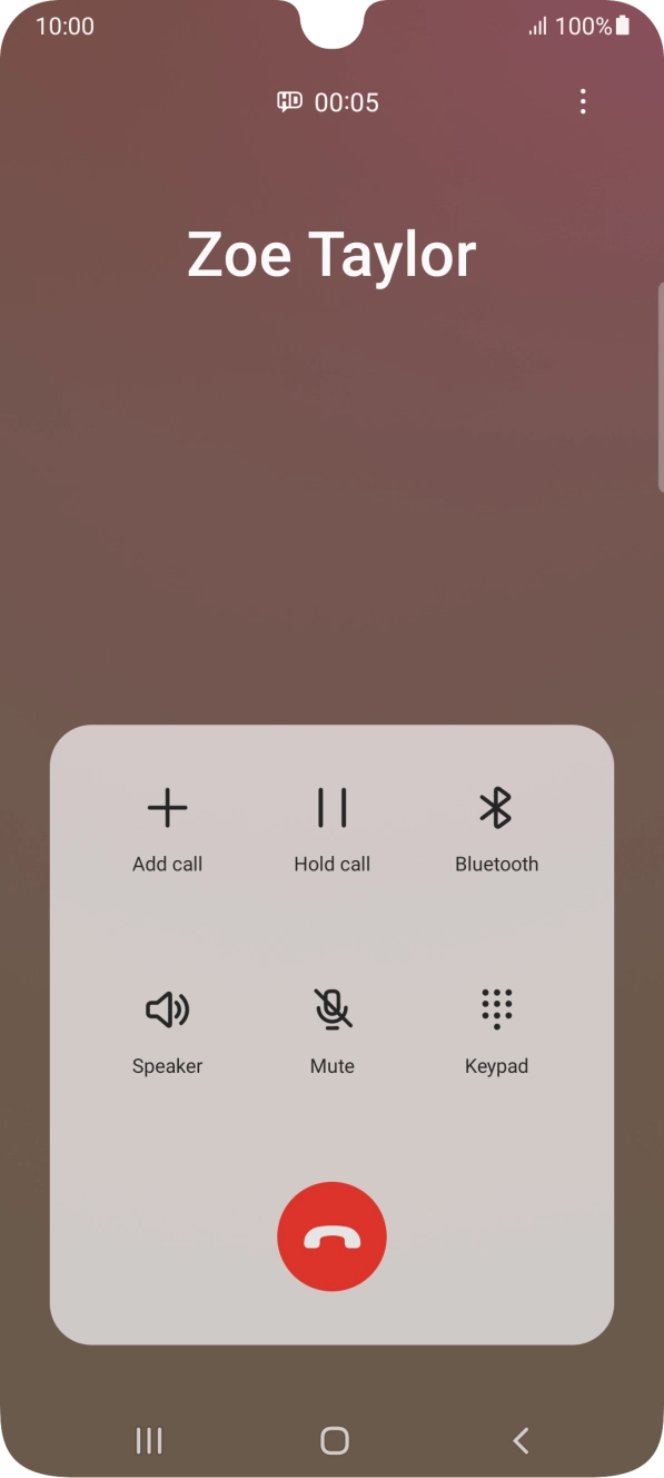 Press the end call icon.