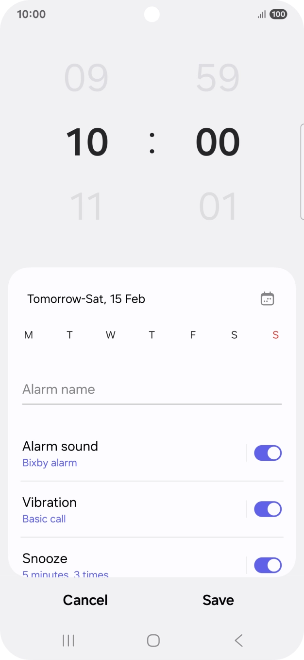Slide your finger up or down on the hour and minute numbers to set the required alarm time.
