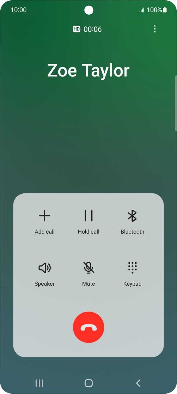 Press the end call icon.