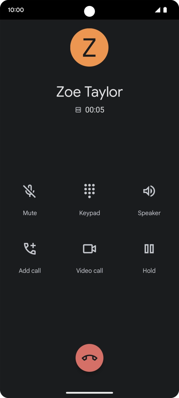 Press the end call icon.
