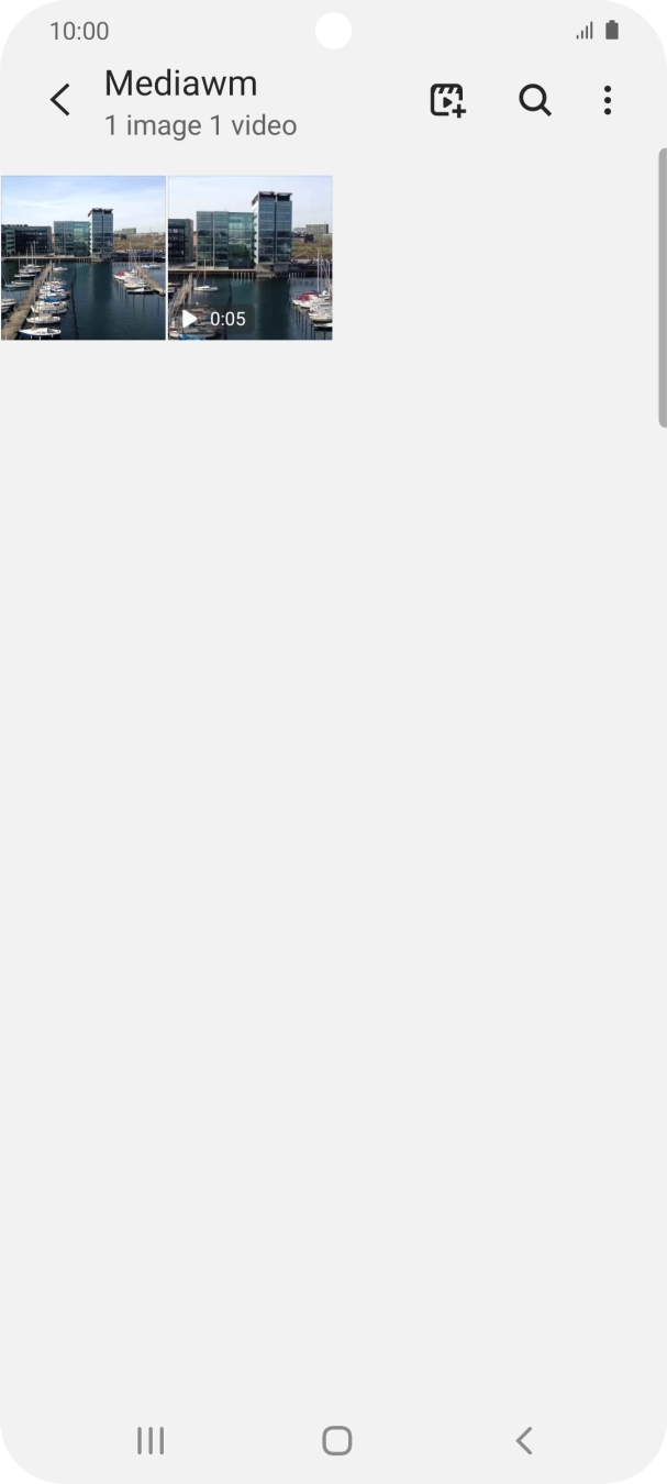 Press and hold any picture or video clip. Press and hold any picture or video clip.