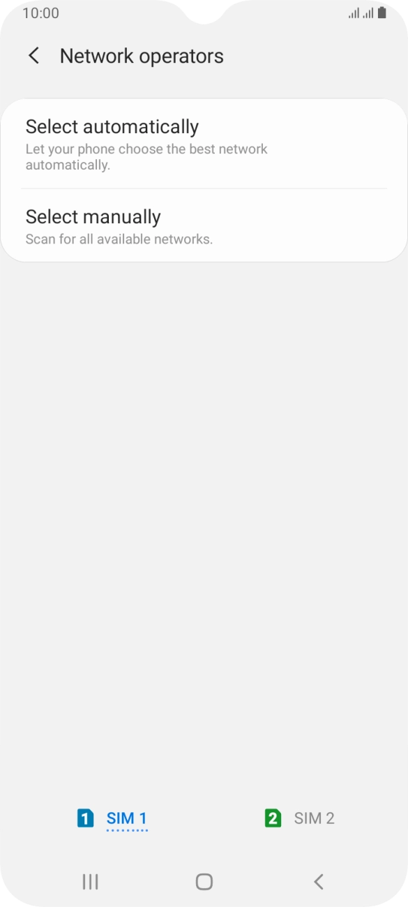 Press Select manually and your phone will search for networks.