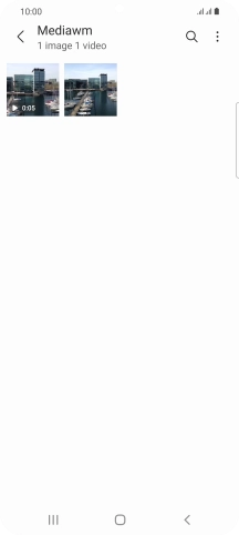 Press and hold any picture or video clip. Press and hold any picture or video clip.