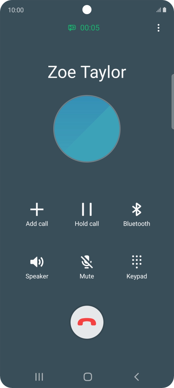 Press the end call icon.