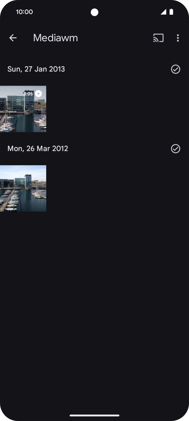 Press and hold any picture or video clip. Press and hold any picture or video clip.