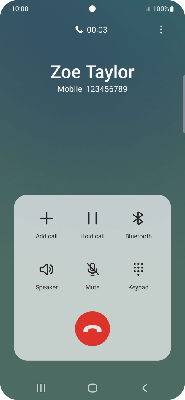 Press the end call icon.