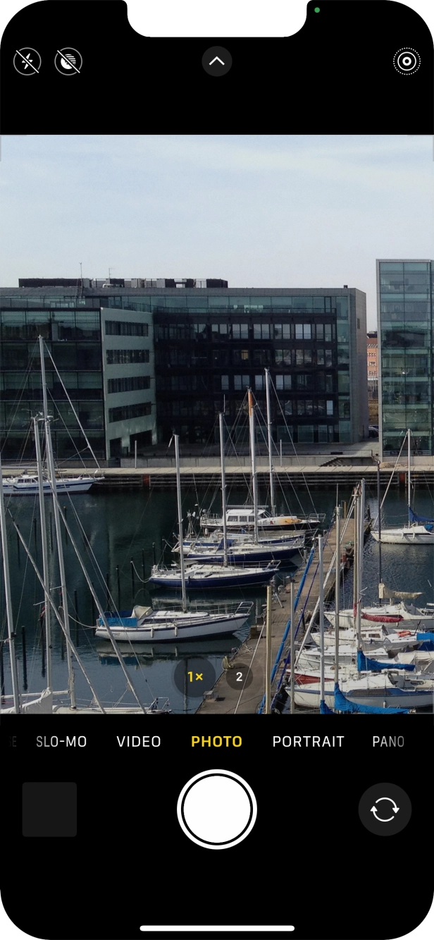 Slide your finger right or left on the screen to select the required camera mode. Slide your finger right or left on the screen to select the required camera mode.