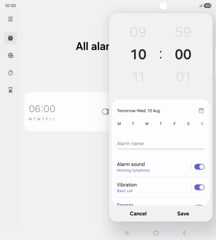 Slide your finger up or down on the hour and minute numbers to set the required alarm time.