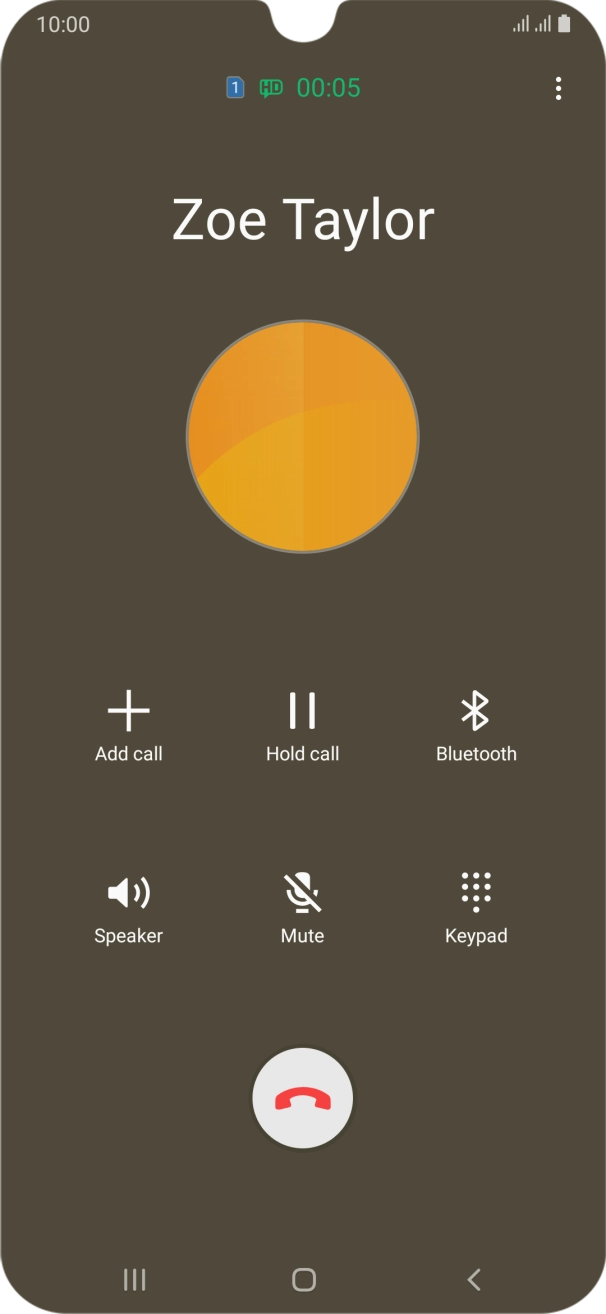 Press the end call icon.