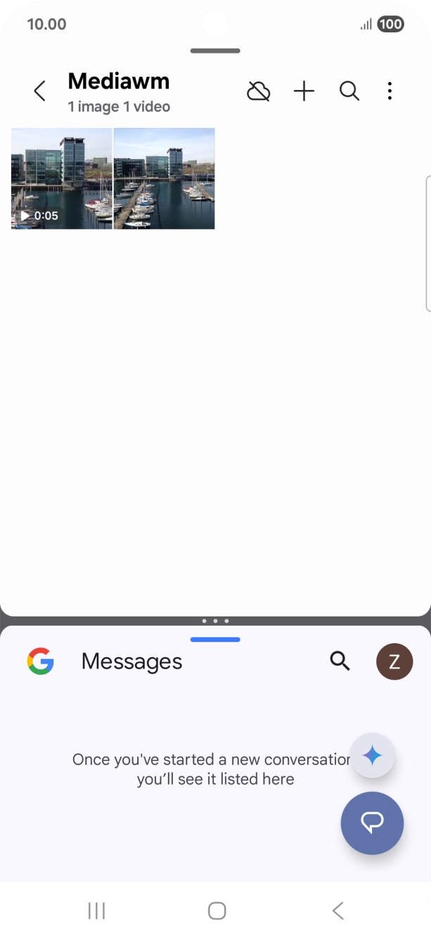 Drag up or down on the screen to adjust the application windows to the required size.