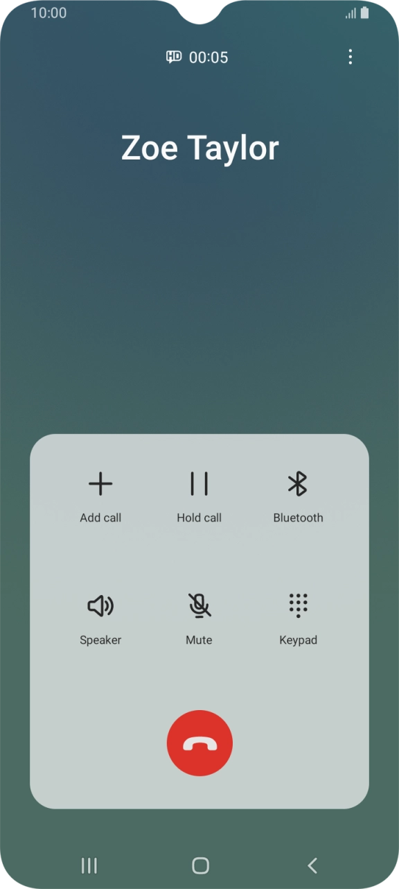 Press the end call icon.