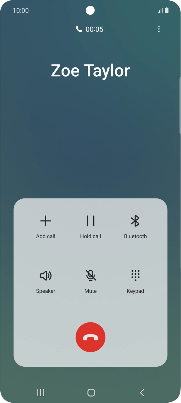 Press the end call icon.
