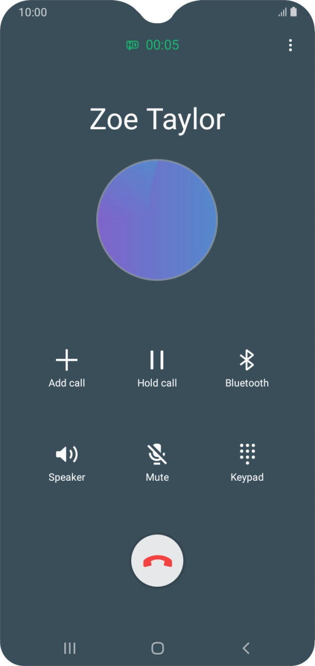 Press the end call icon.