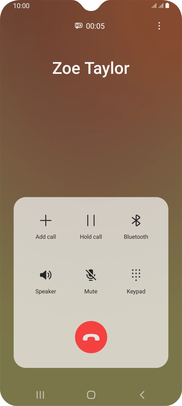 Press the end call icon.