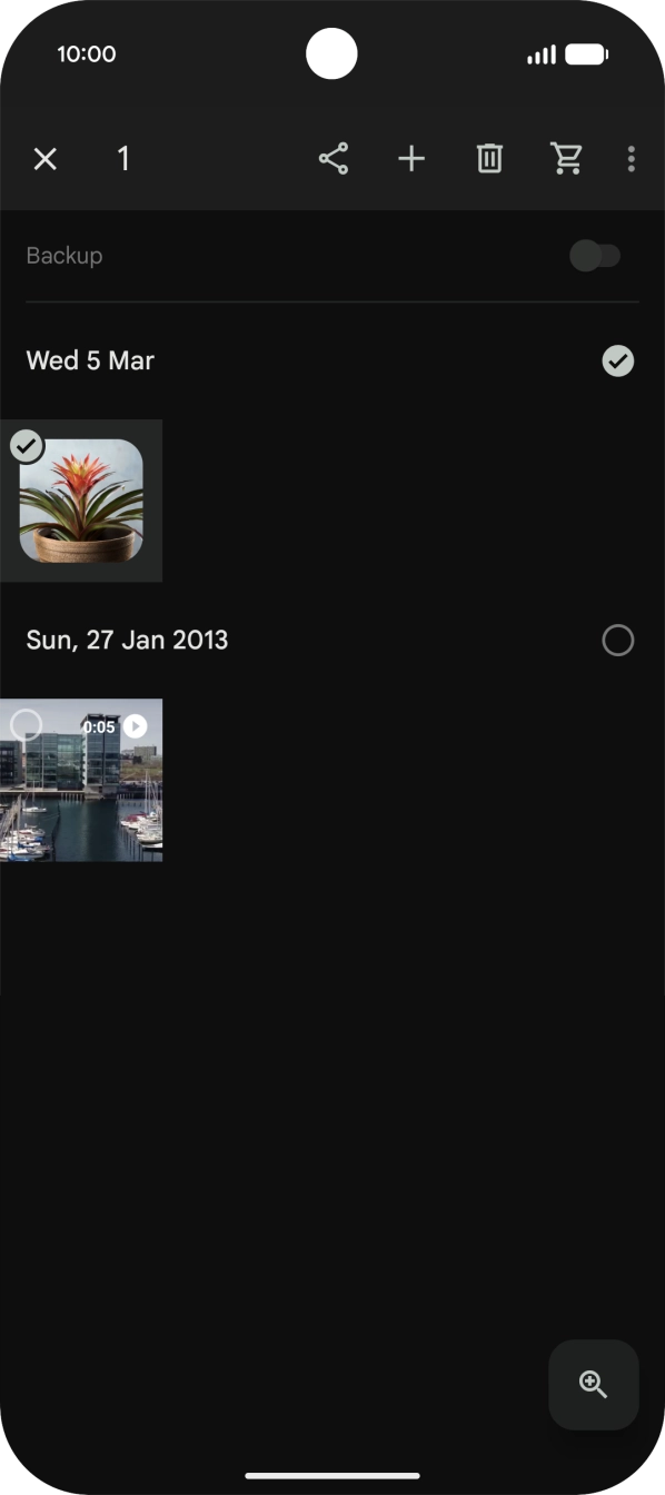Press the required pictures or videos to select them.