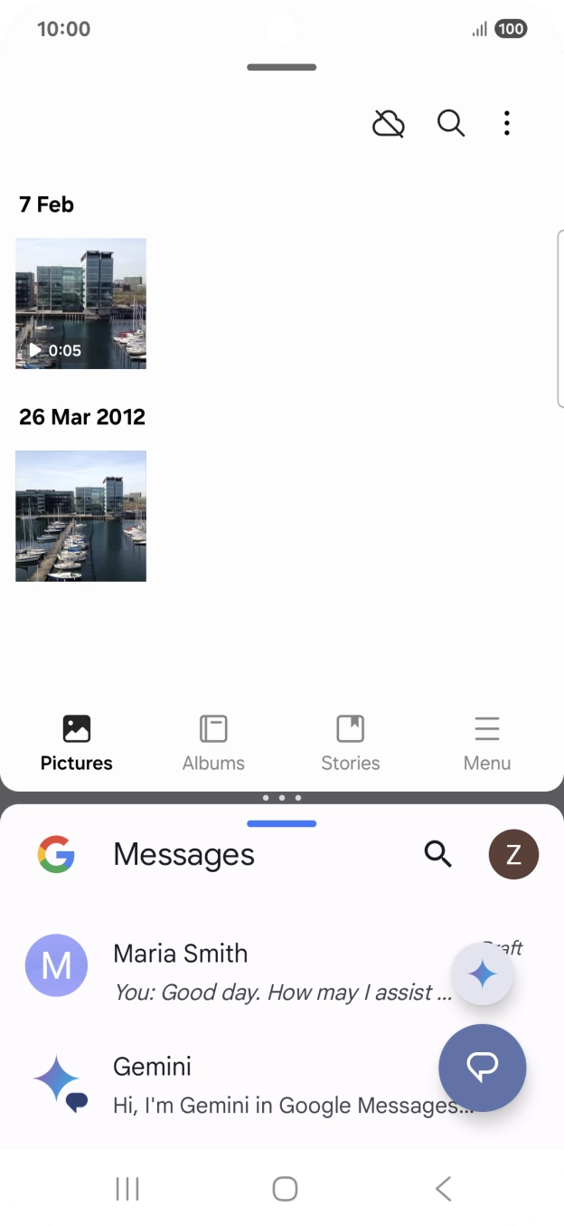 Drag up or down on the screen to adjust the application windows to the required size.