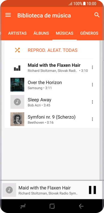 Prima o título da música na parte inferior do ecrã.