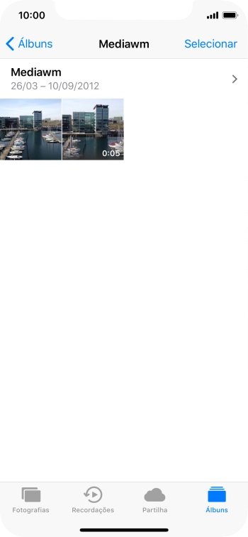 Prima firmemente a imagem pretendida até aparecer um menu no ecrã.