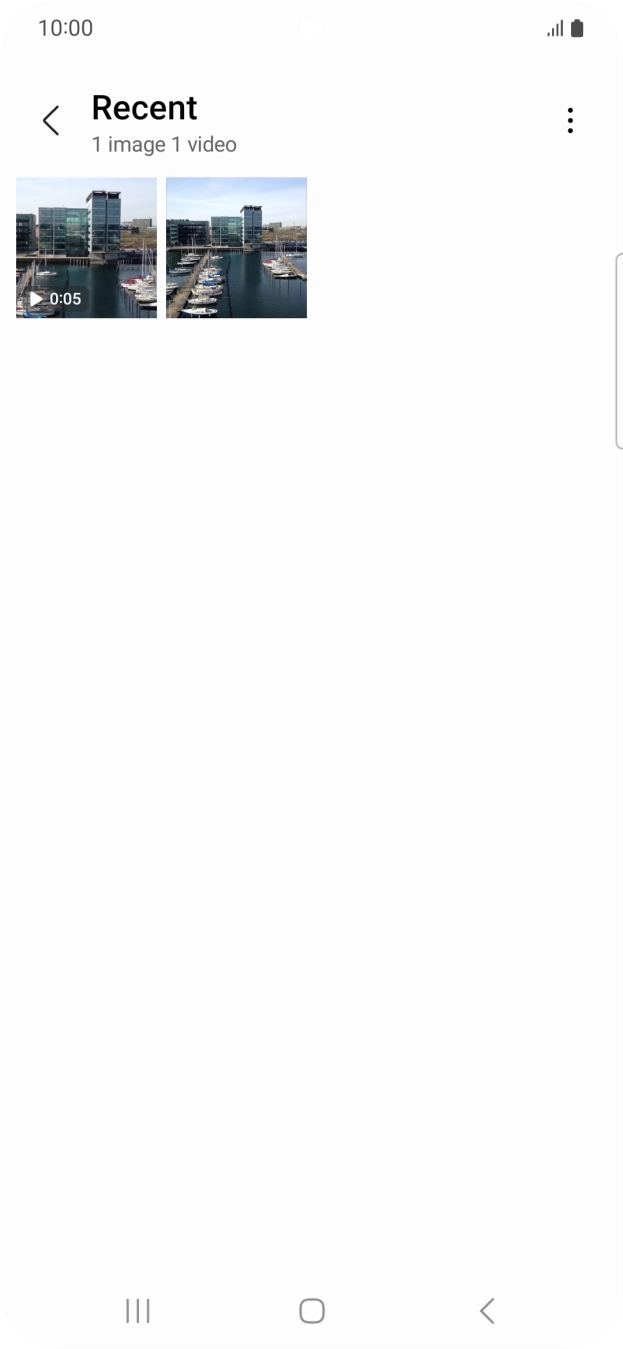 Press and hold any picture or video clip. Press and hold any picture or video clip.