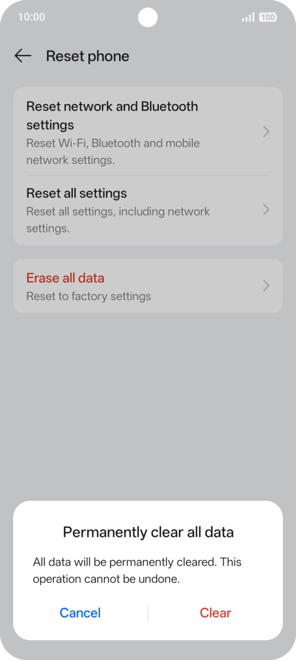 Press Clear. Wait a moment while the factory default settings are restored. Follow the instructions on the screen to set up your phone and prepare it for use.