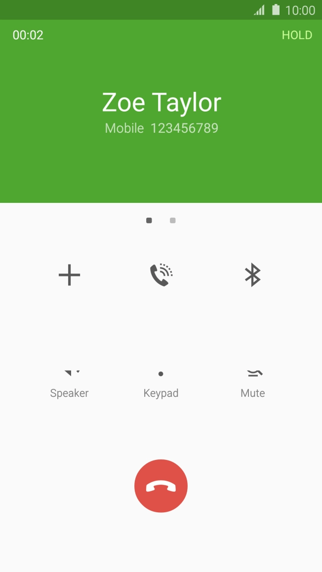 Press the end call icon.