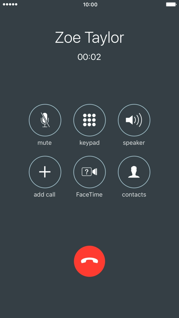 Press the end call icon.