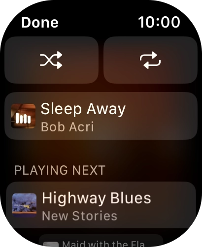 Press the shuffle icon. Press the shuffle icon.