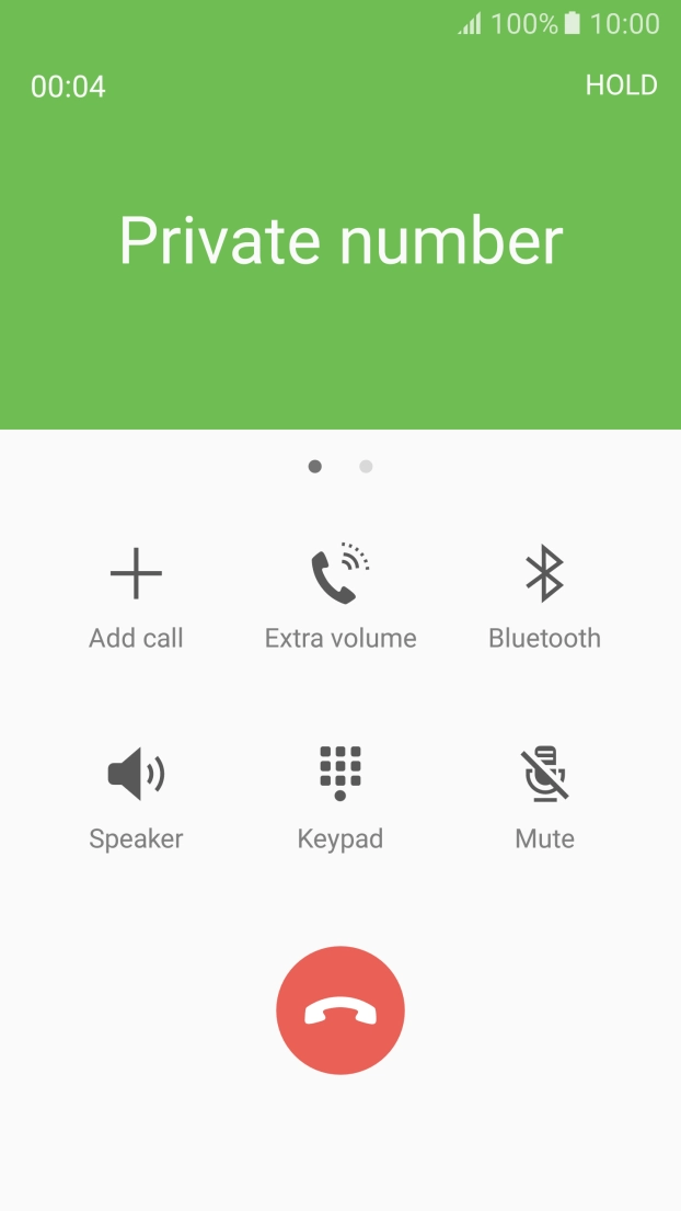 Press the end call icon.