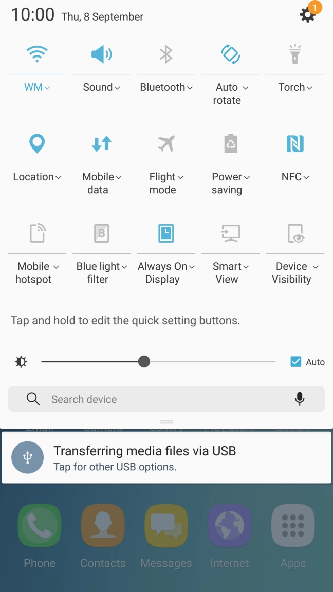 Press Auto to turn automatic brightness on or off.