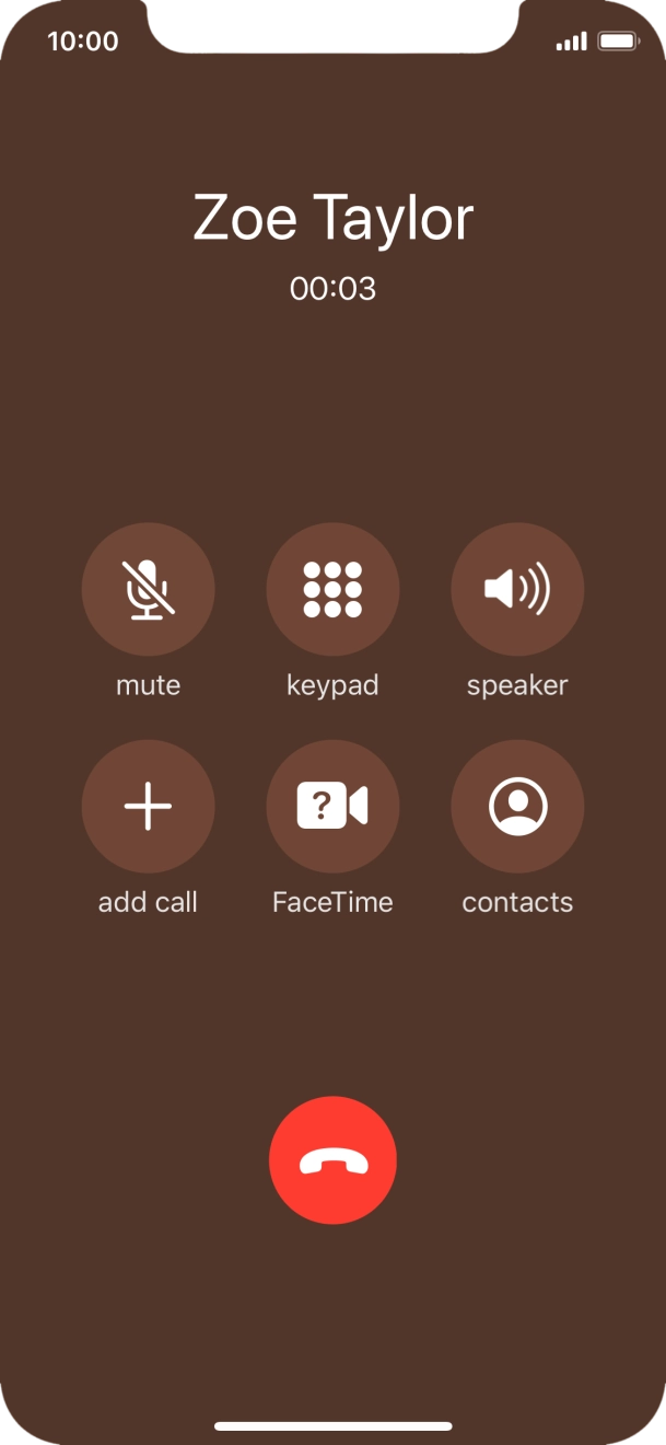 Press the end call icon.