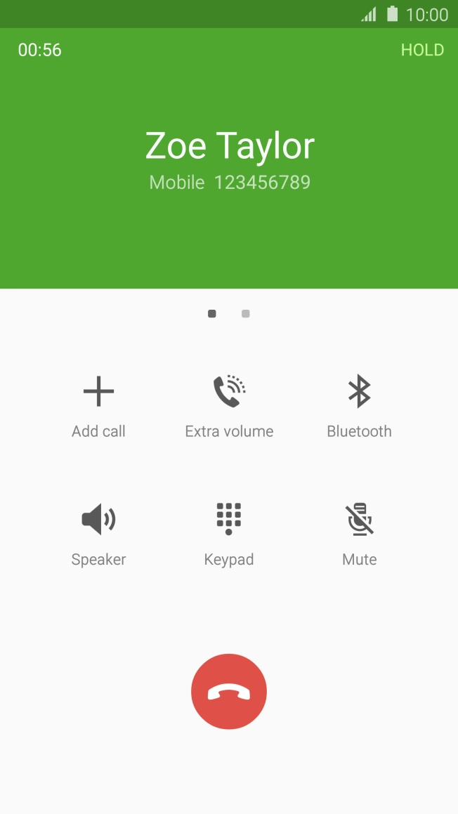 Press the end call icon to end the other call.