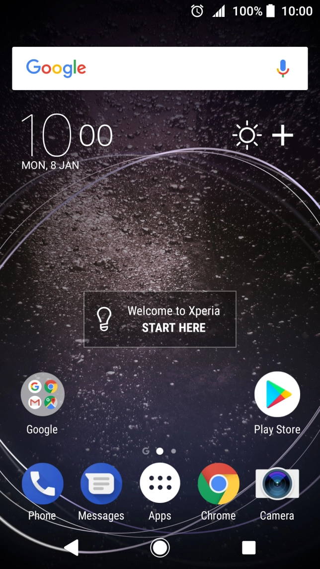 The alarm icon shows that the alarm is set.