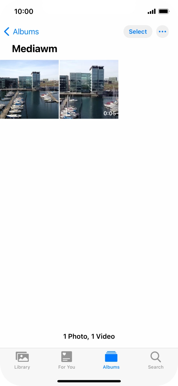 Go to the required folder and press the required picture or video clip.