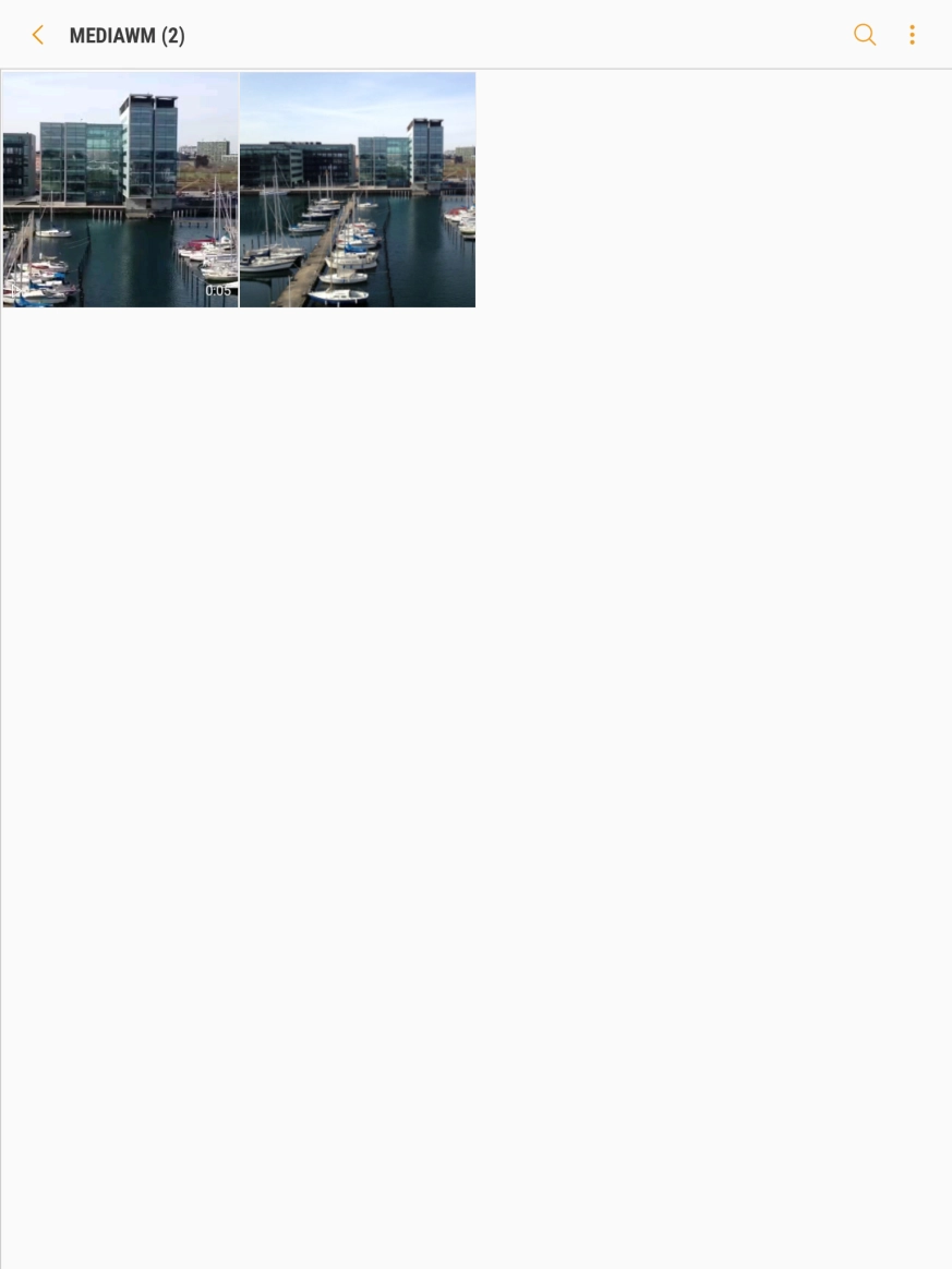 Press and hold the required picture or video clip. Press and hold the required picture or video clip.