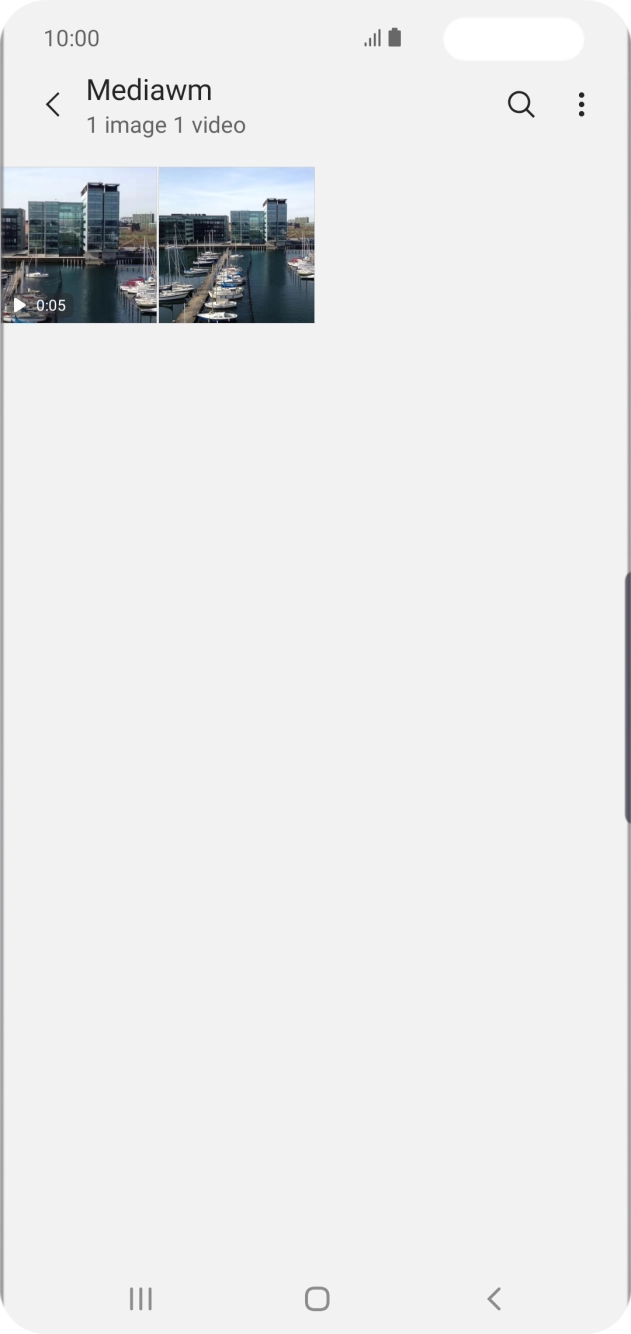 Press and hold any picture or video clip. Press and hold any picture or video clip.